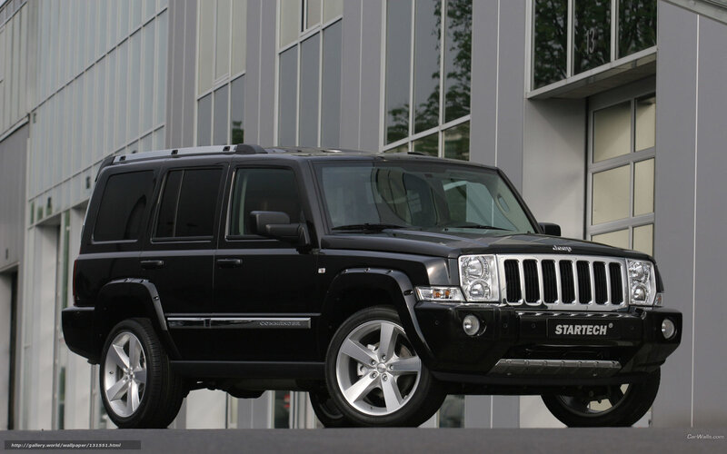 Black Jeep Commander parked outside