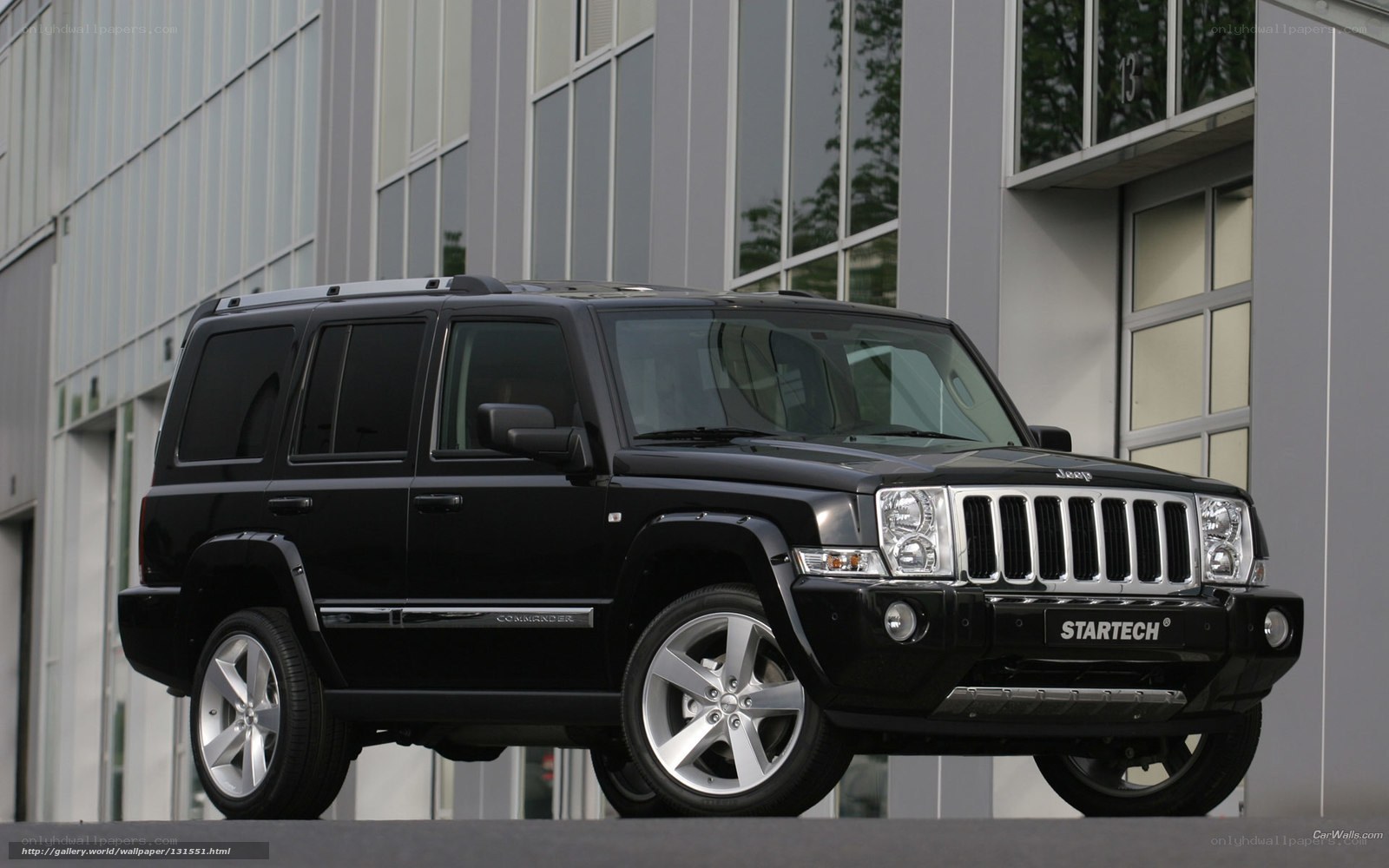 Black Jeep Commander parked outside