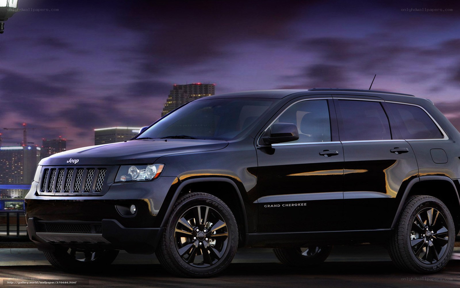 Black Jeep Grand Cherokee at dusk