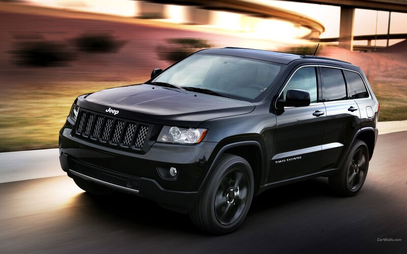 Black Jeep Grand Cherokee in motion