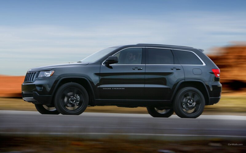black jeep grand cherokee in motion