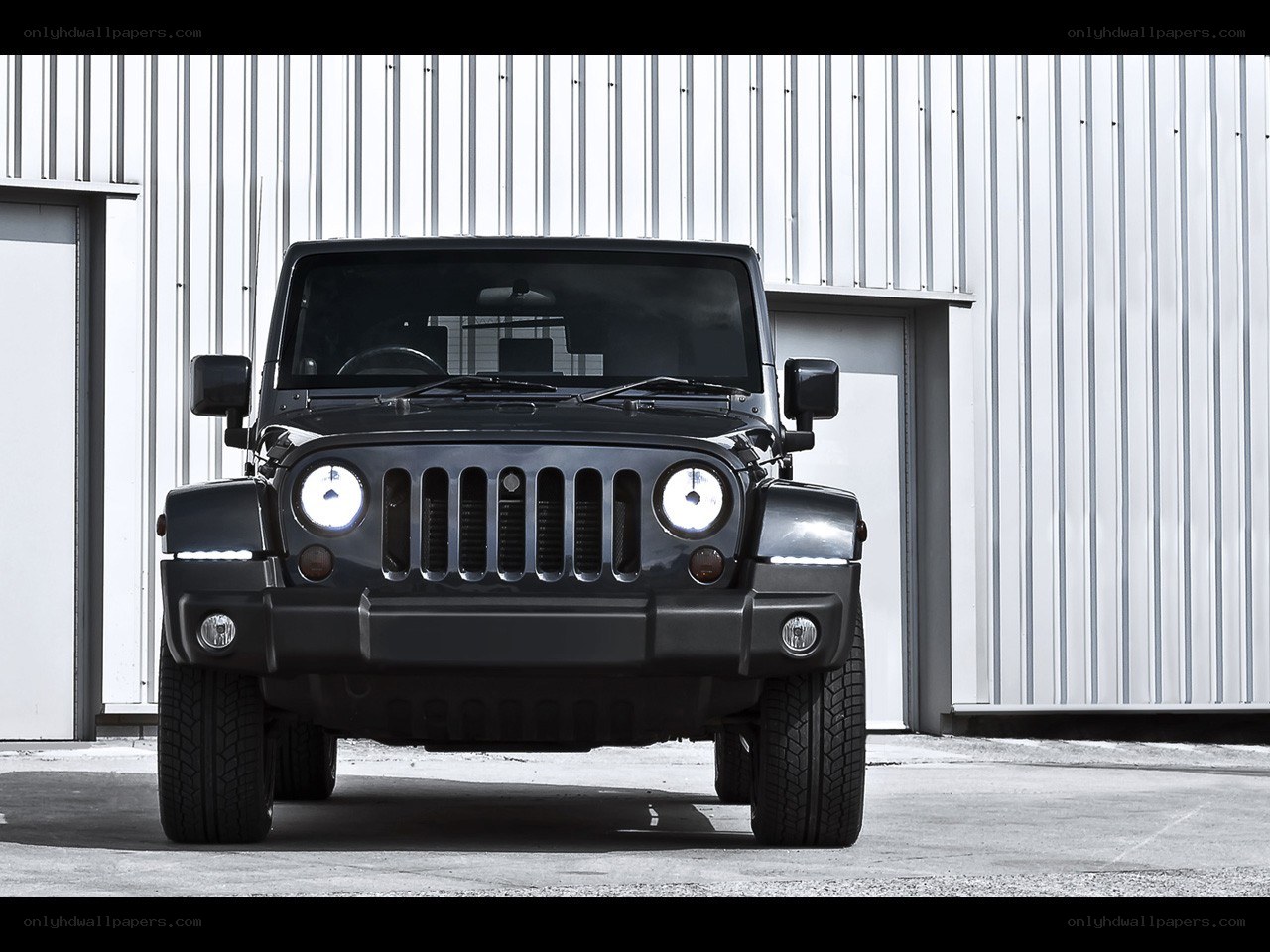 Black Jeep Wrangler front view