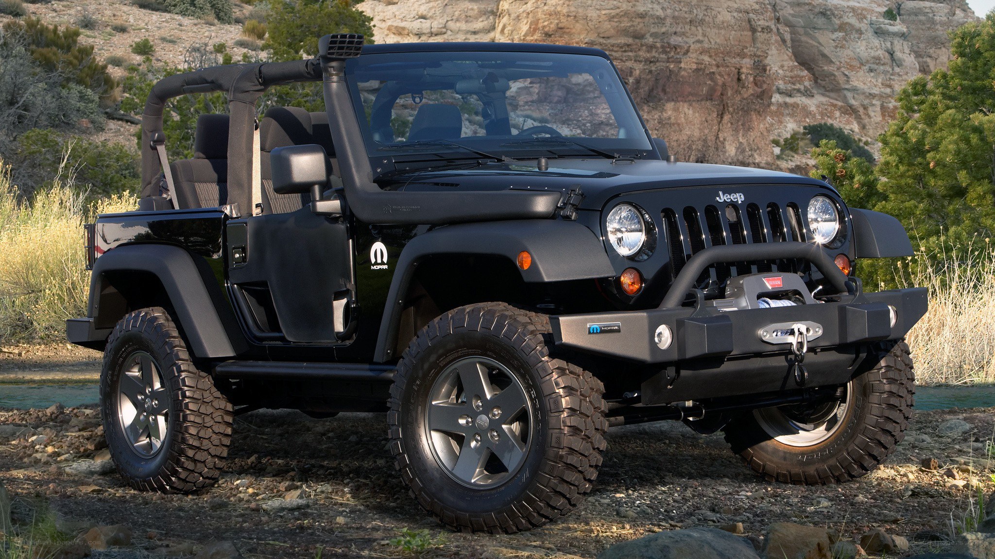 black jeep wrangler in desert