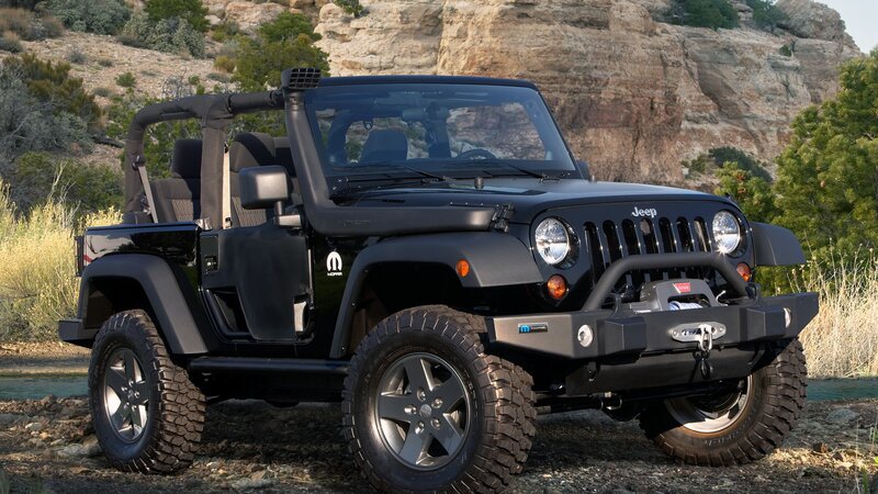 Black Jeep Wrangler in desert