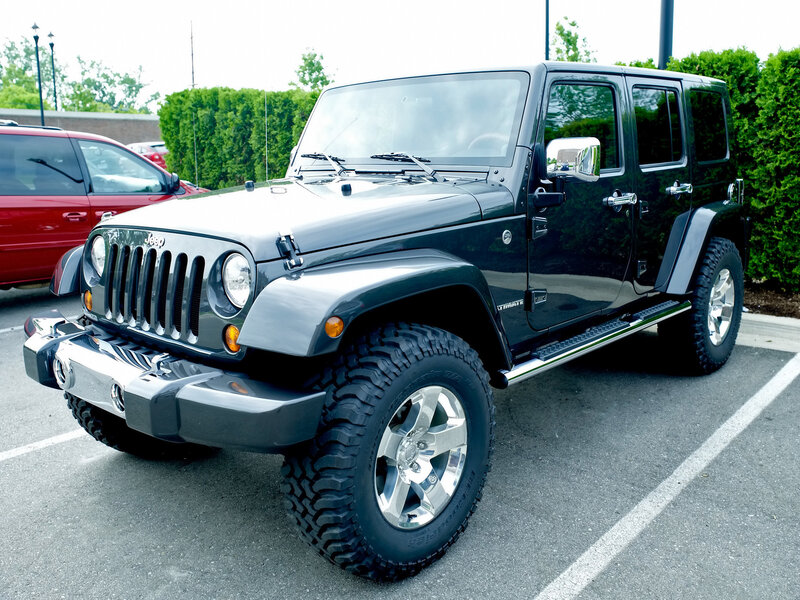 Black Jeep Wrangler in parking lot