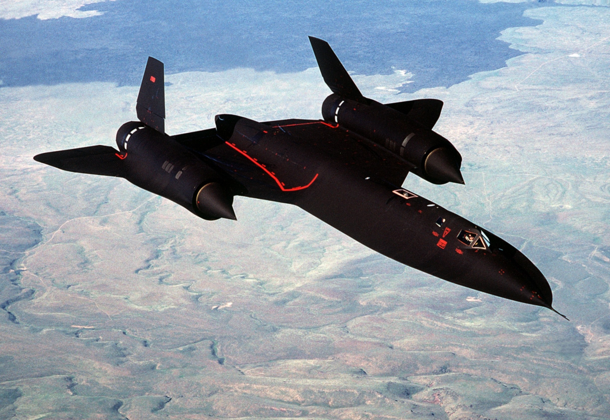 Black jet aircraft in flight
