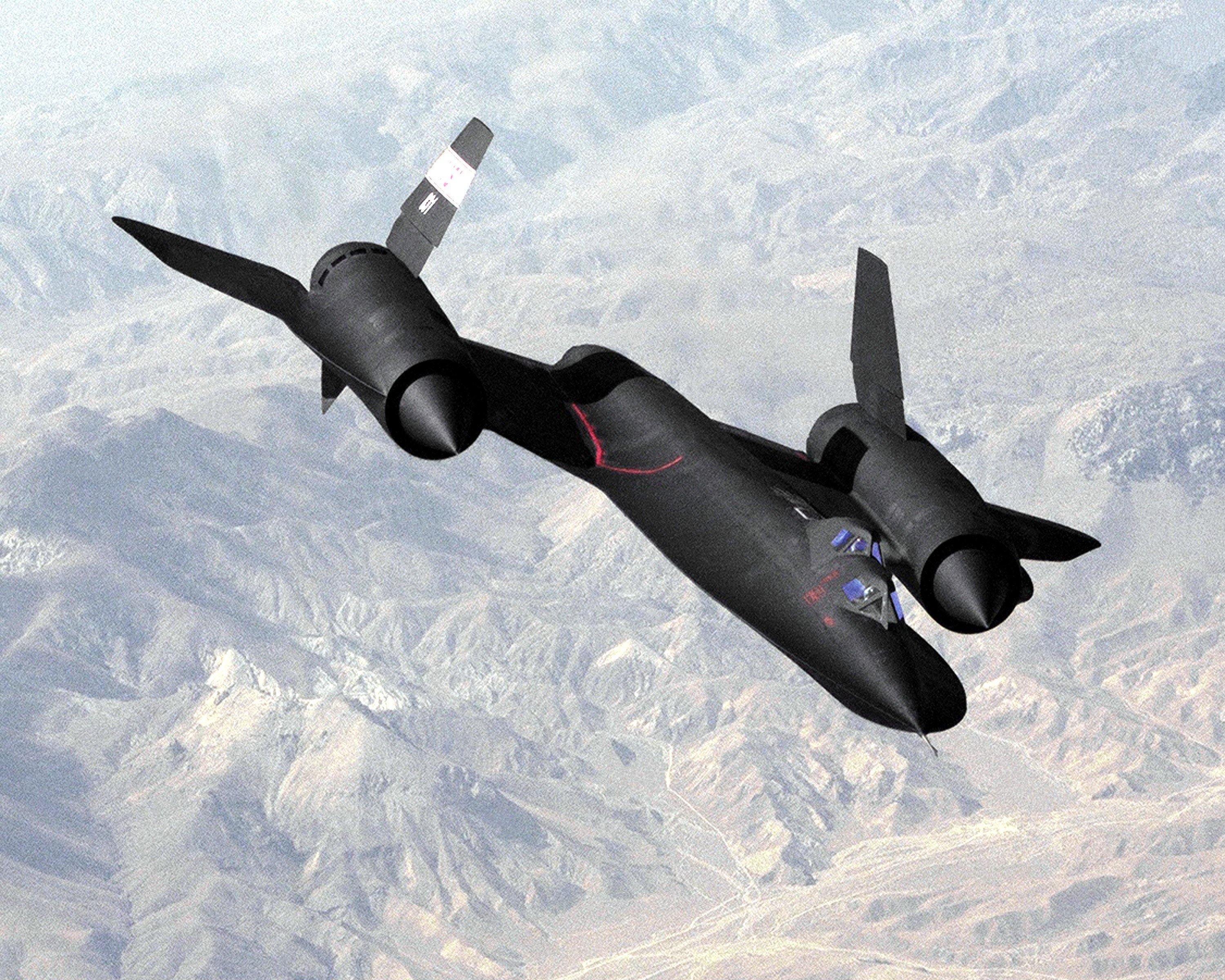 Black jet aircraft in flight