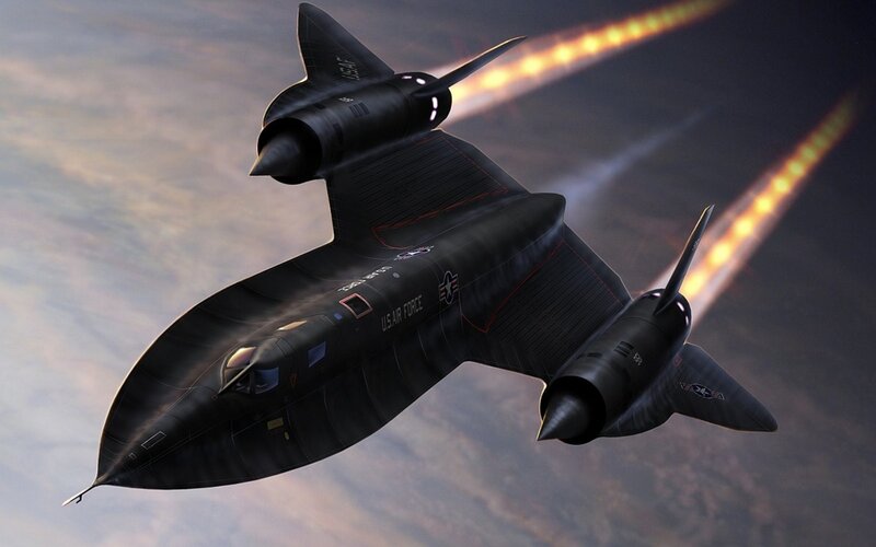 Black jet aircraft in flight