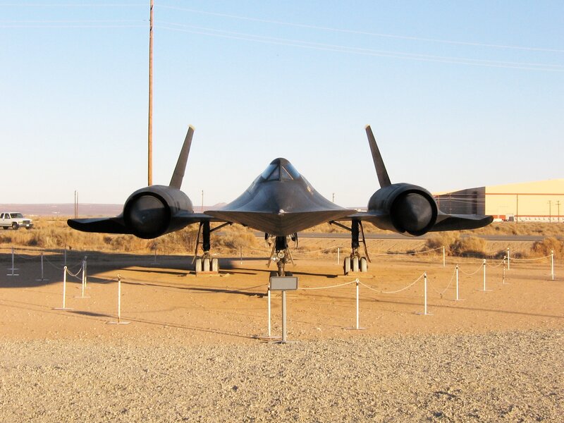 Black jet aircraft on display