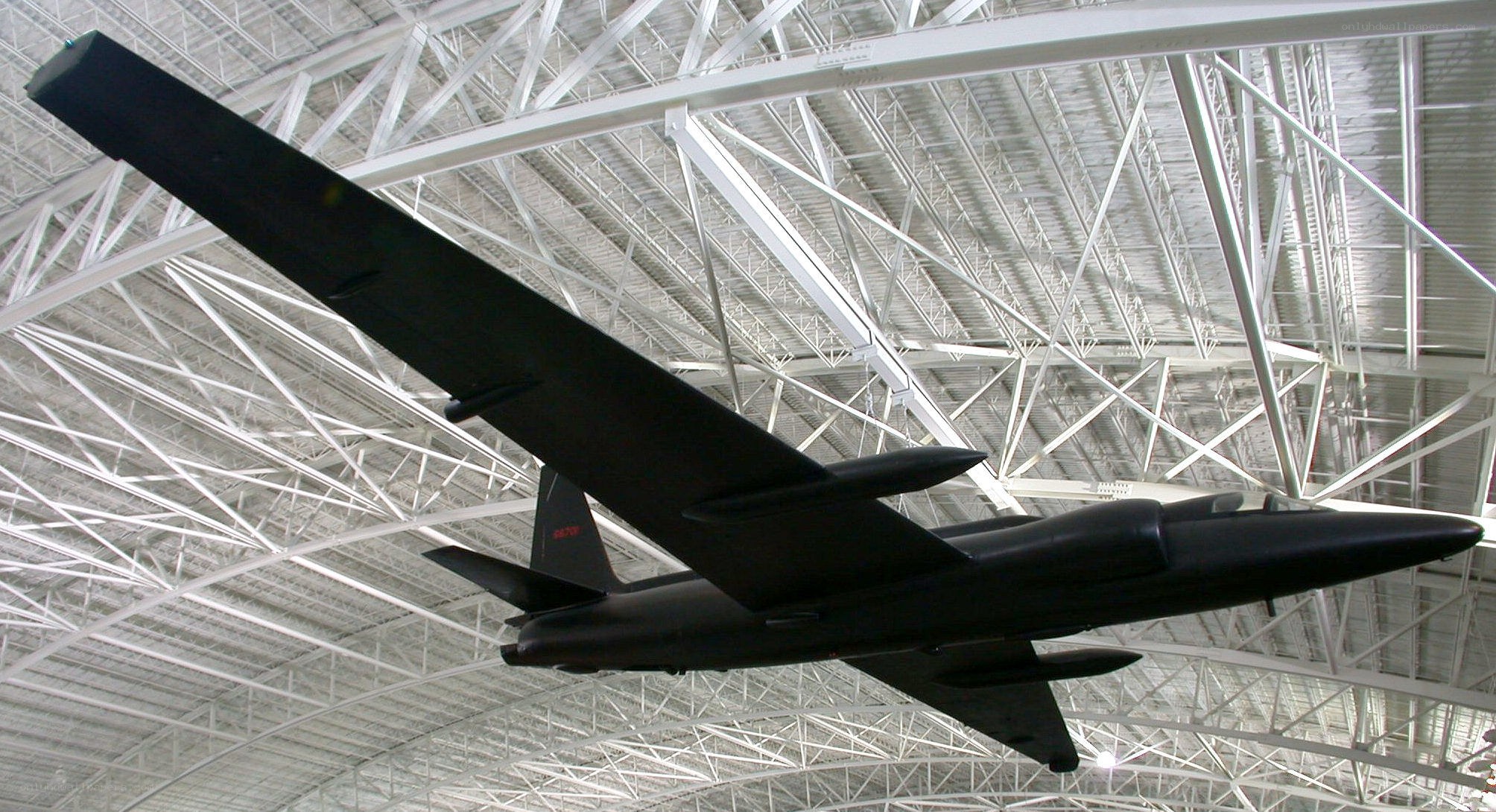 Black jet aircraft on display