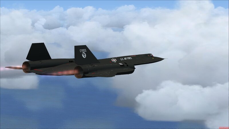 Black jet flying above clouds