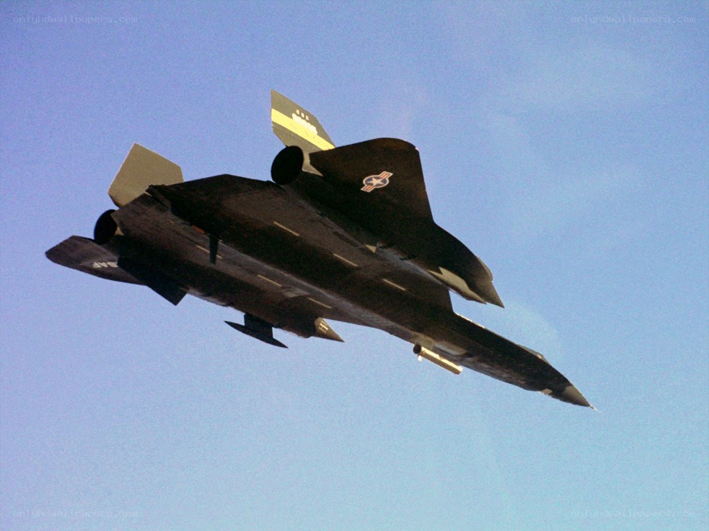 Black jet flying in the sky