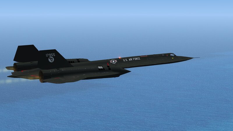 Black Jet Flying over Ocean — Blue