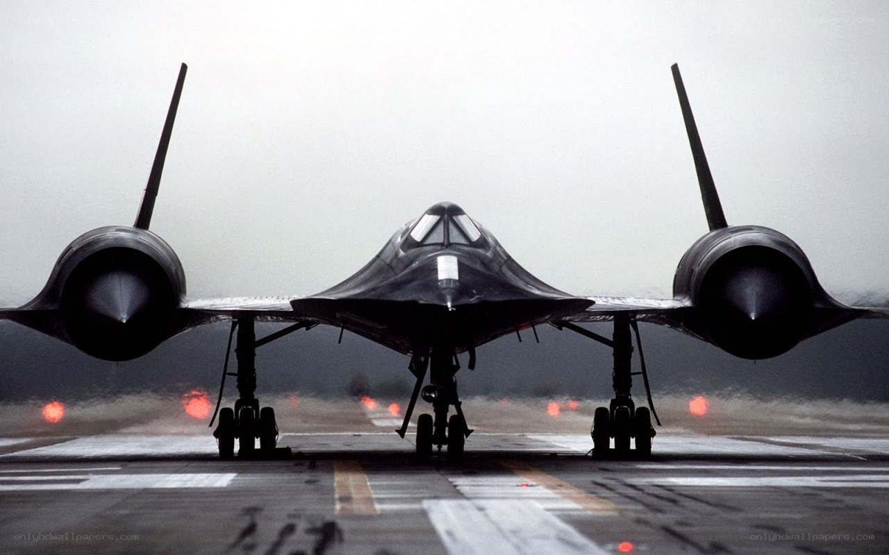 Black jet on runway
