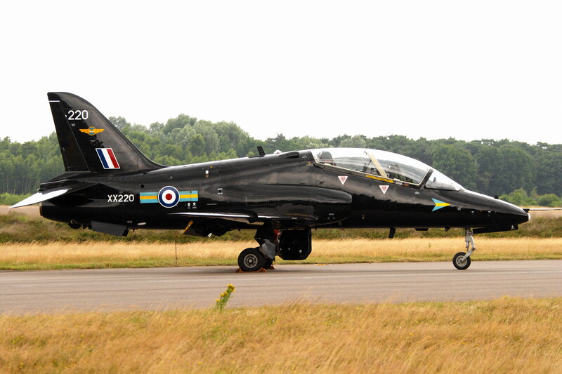 Black jet on runway
