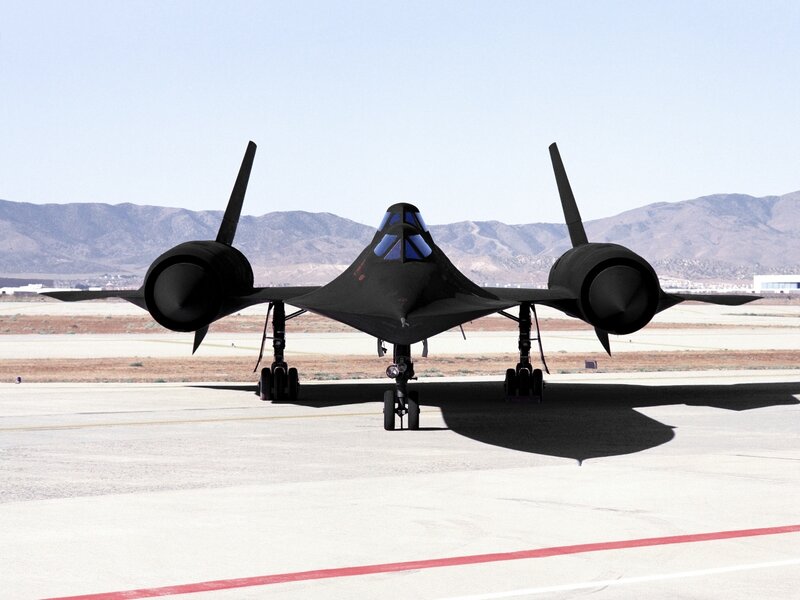 Black jet on runway