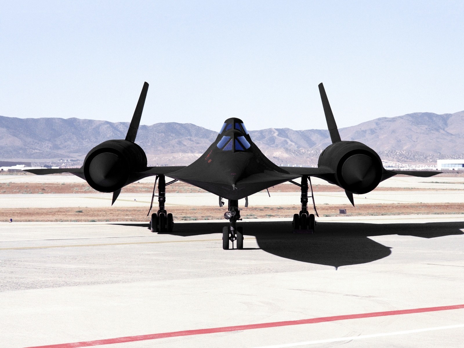 Black jet on runway