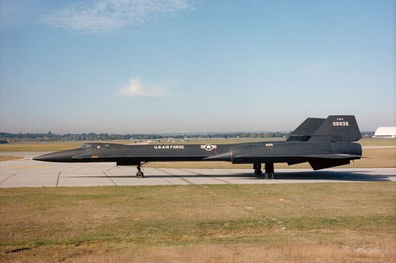 Black Jet on Runway — Calm, Afternoon
