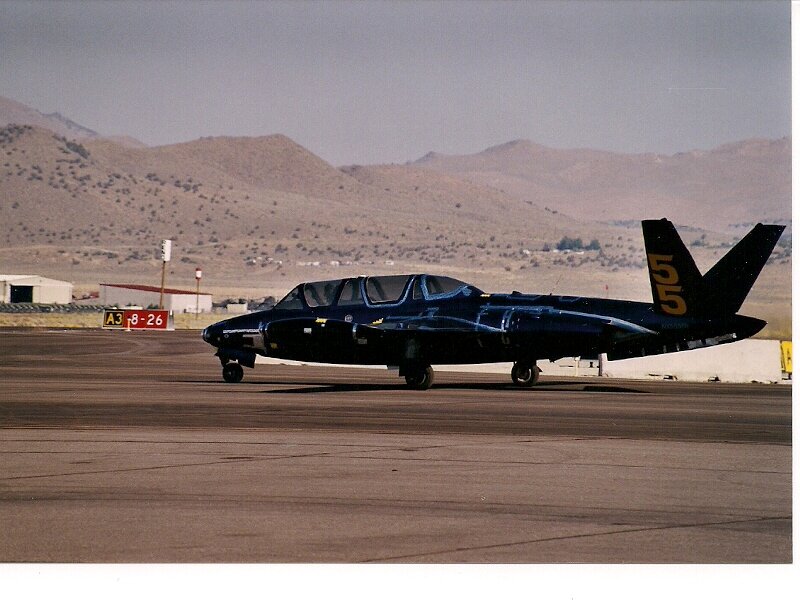 Black Jet on Runway — Desert