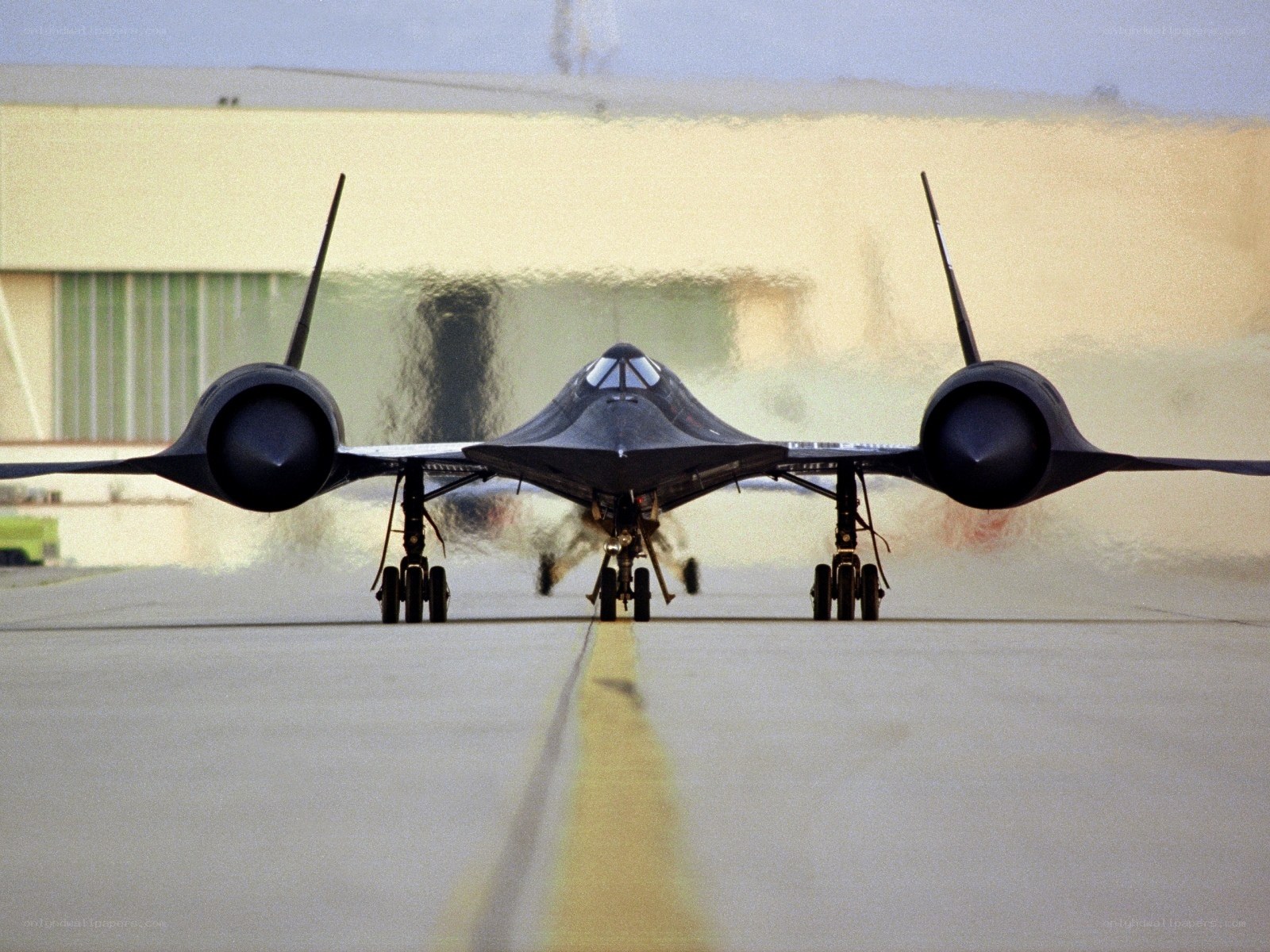 Black jet on runway
