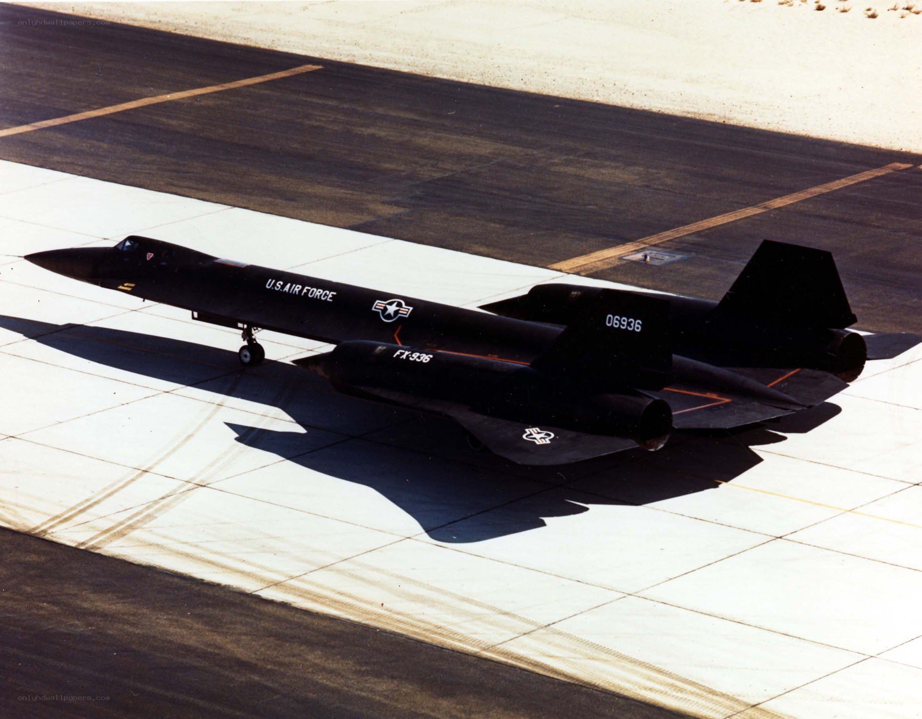 Black jet on tarmac