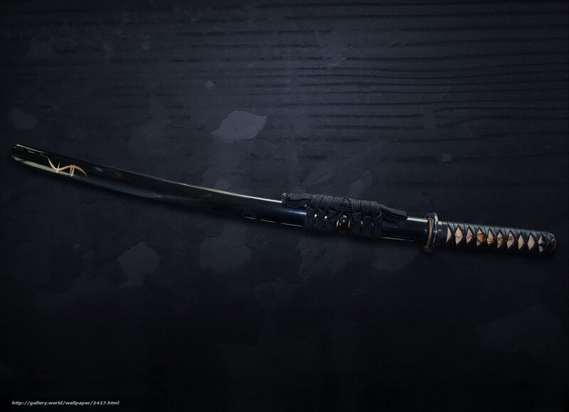 black katana on dark surface