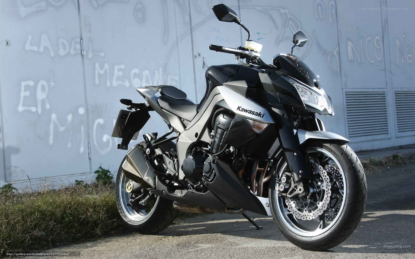 Black Kawasaki motorcycle on street