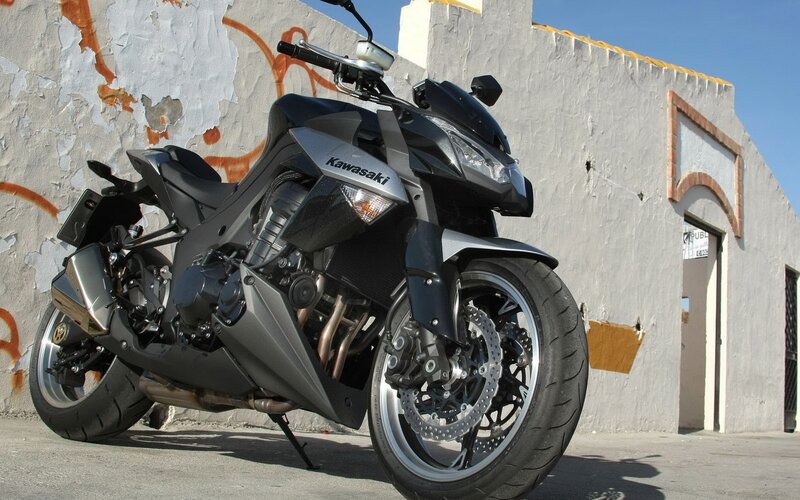 Black Kawasaki motorcycle parked