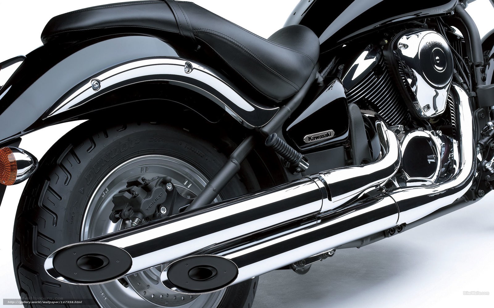 Black Kawasaki motorcycle rear view
