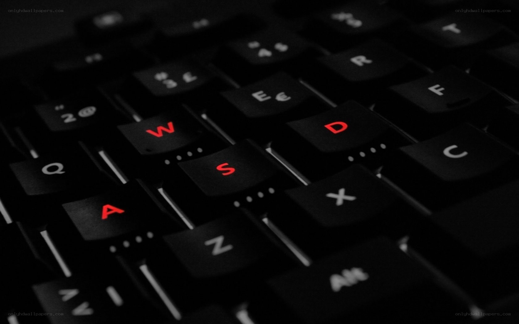 black keyboard with red backlit keys