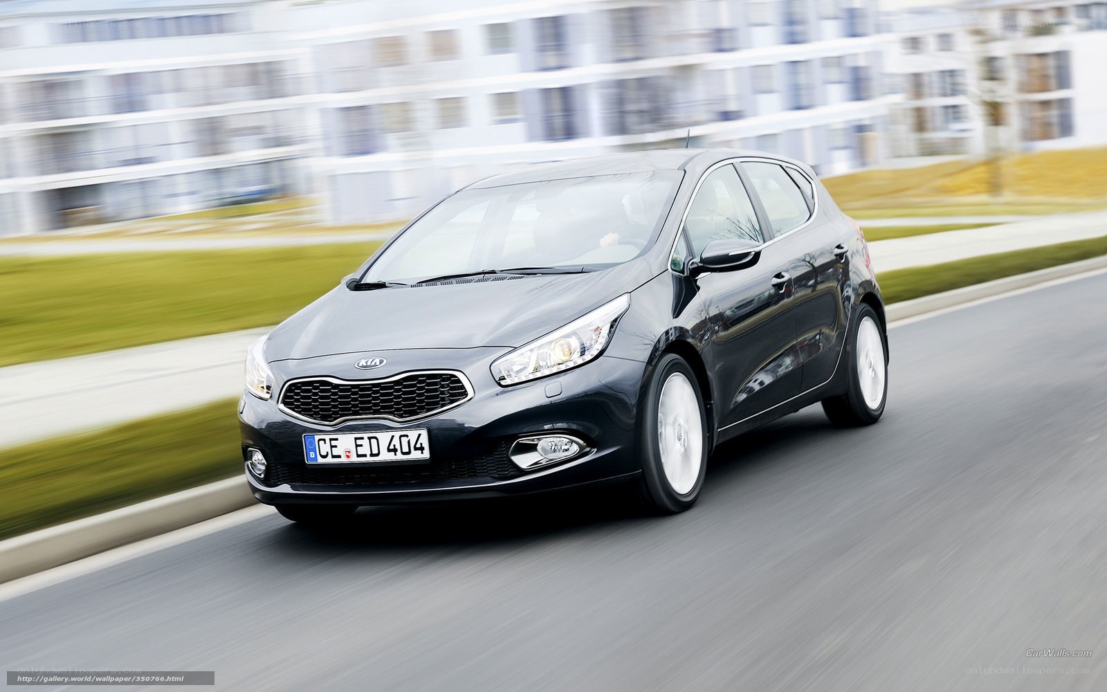 Black Kia Ceed in motion
