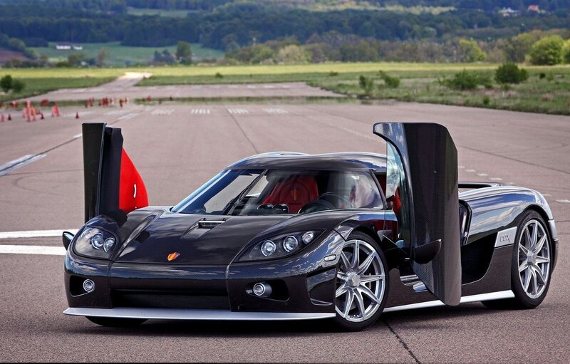 Black Koenigsegg CCX on airstrip
