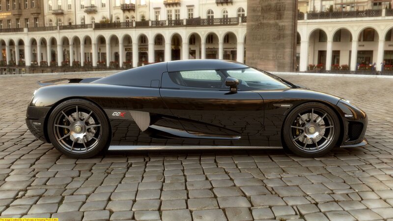 Black Koenigsegg CCX on cobblestones