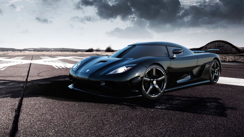 Black Koenigsegg on runway