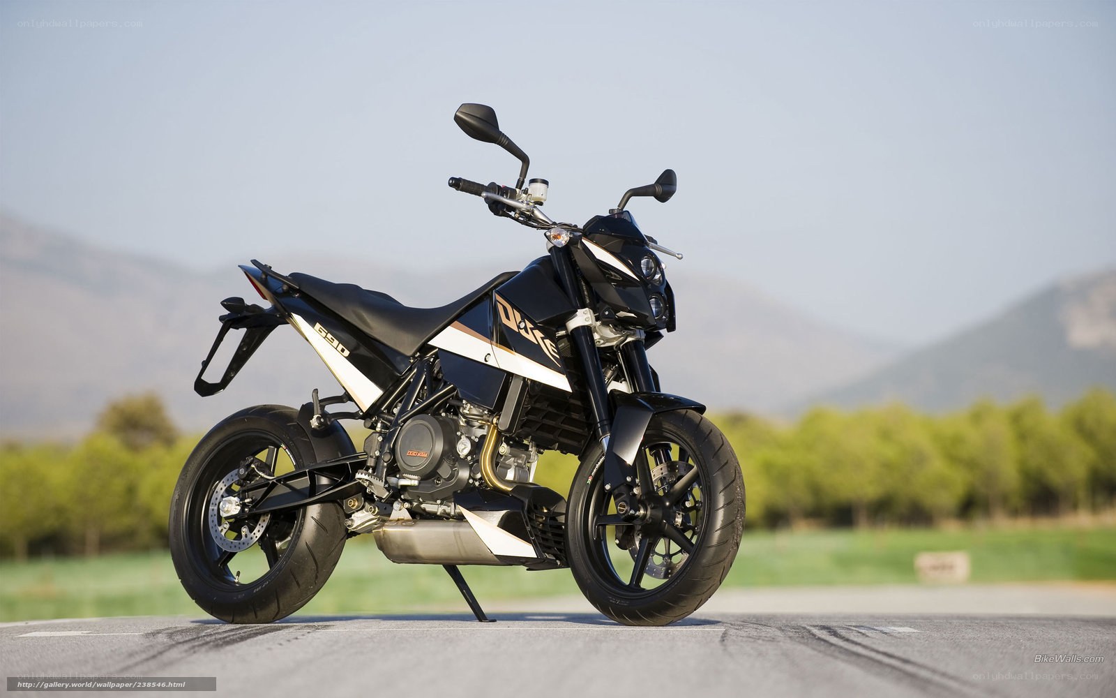 black ktm motorcycle on road