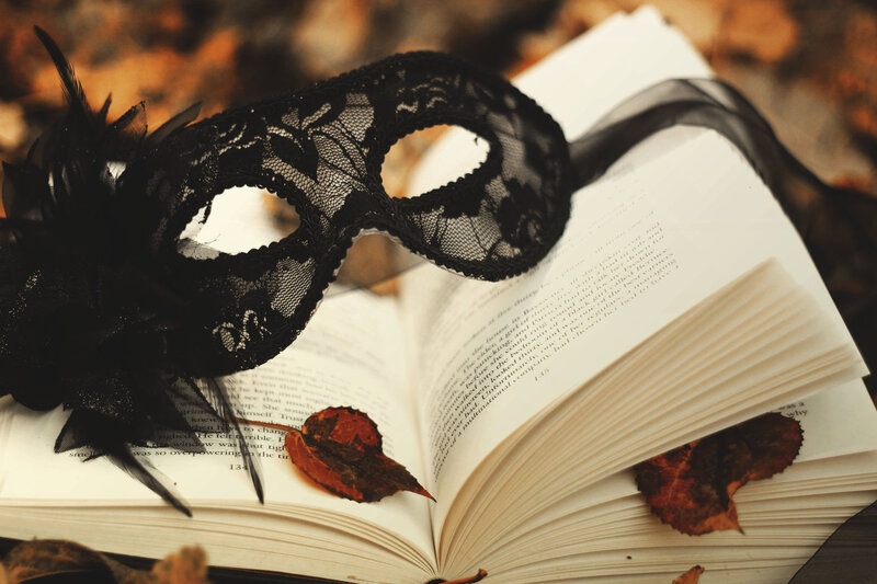 Black Lace Mask on Book