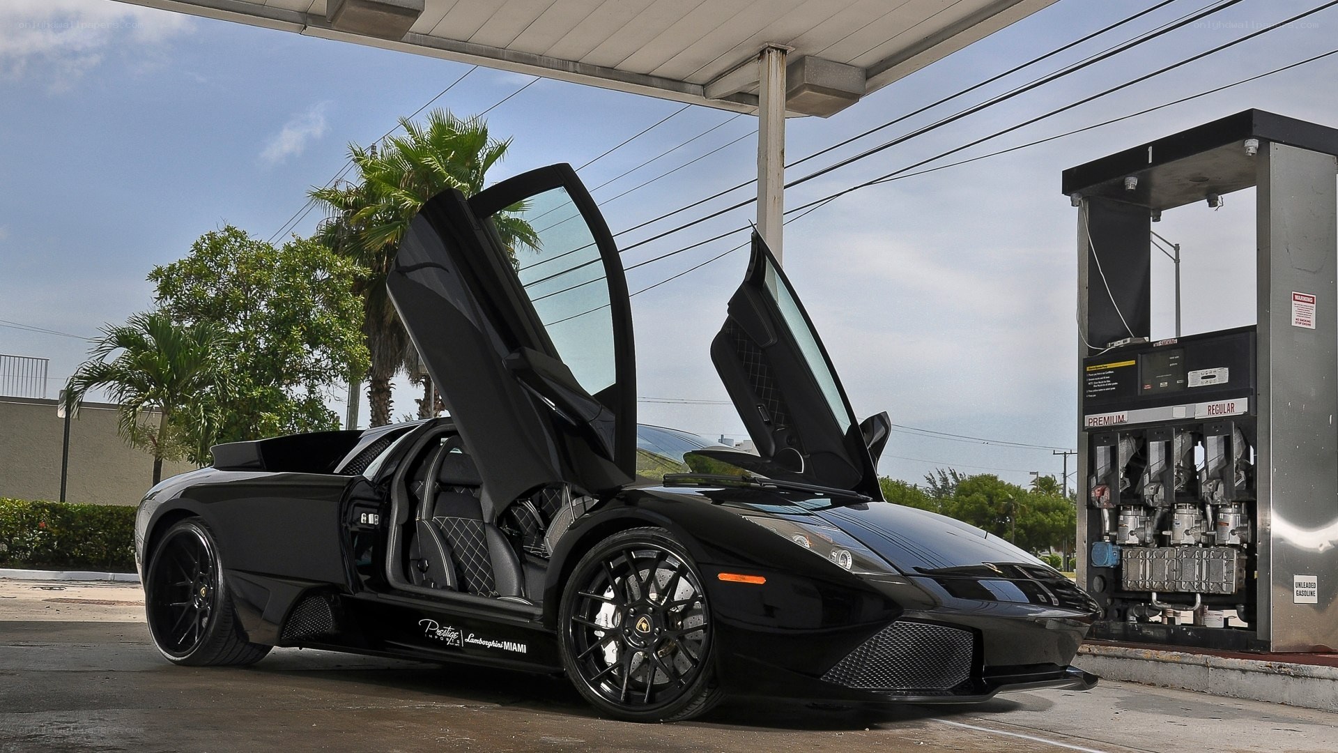 Black Lamborghini at gas station