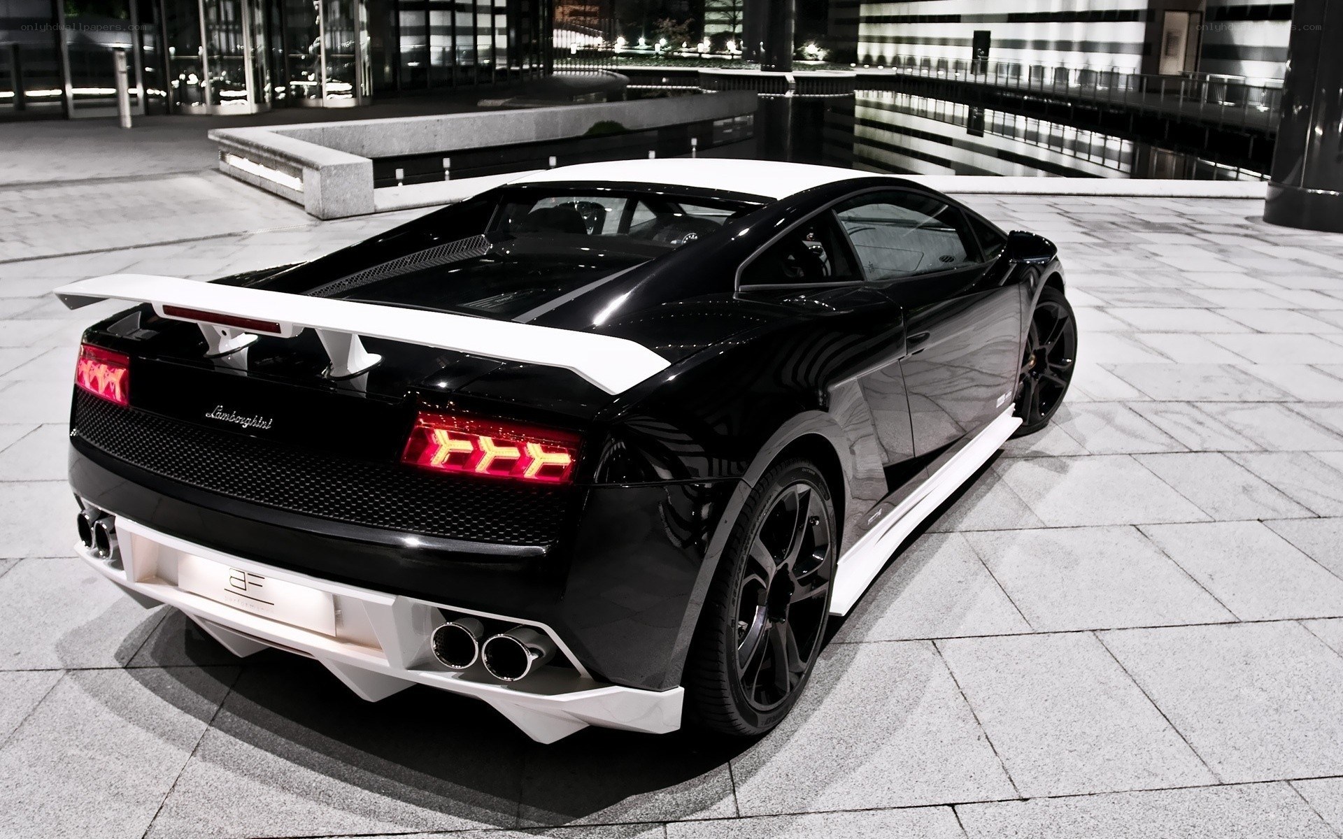 black lamborghini at night