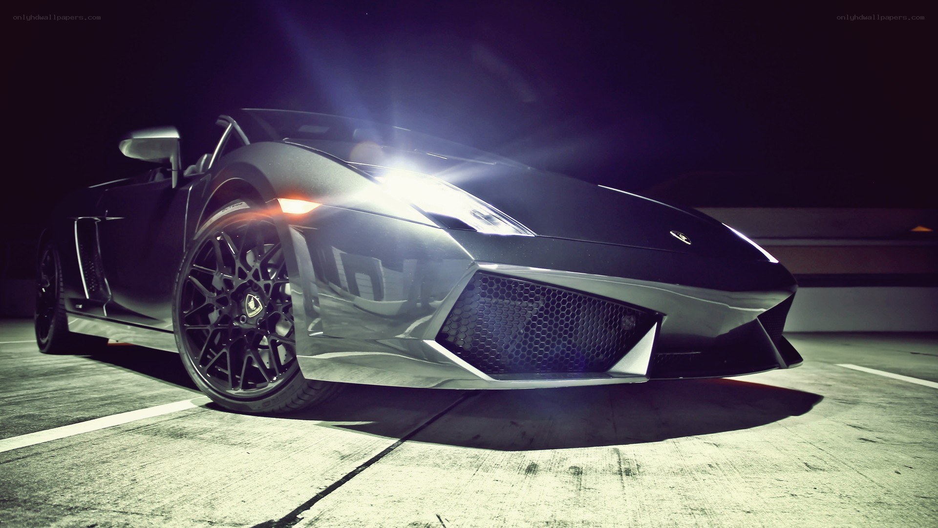 black lamborghini at night