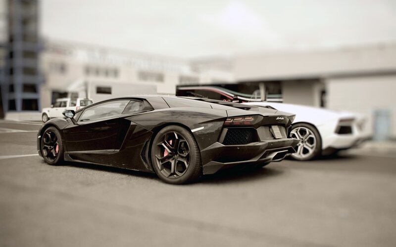 Black Lamborghini Aventador — Calm, Photograph, White Sports Car, Parking Lot, Building
