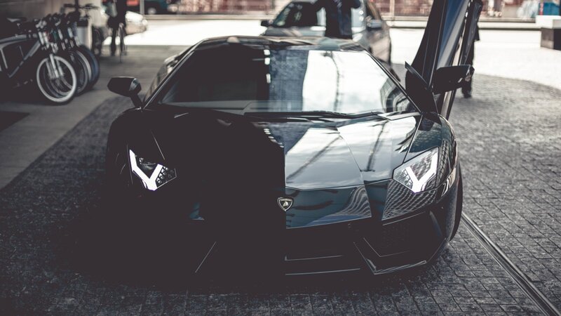 Black Lamborghini Aventador — Dramatic, Photograph, Bicycles