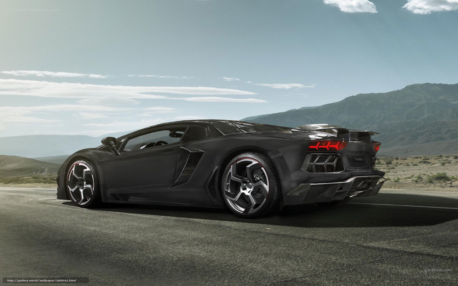 Black Lamborghini in desert