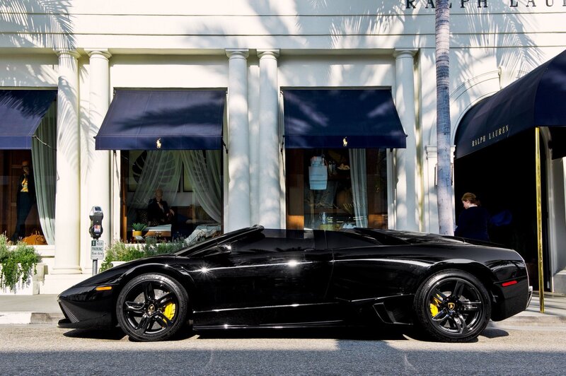 Black Lamborghini in front of Ralph Lauren