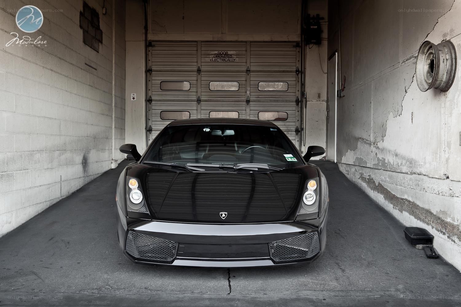 Black Lamborghini in garage