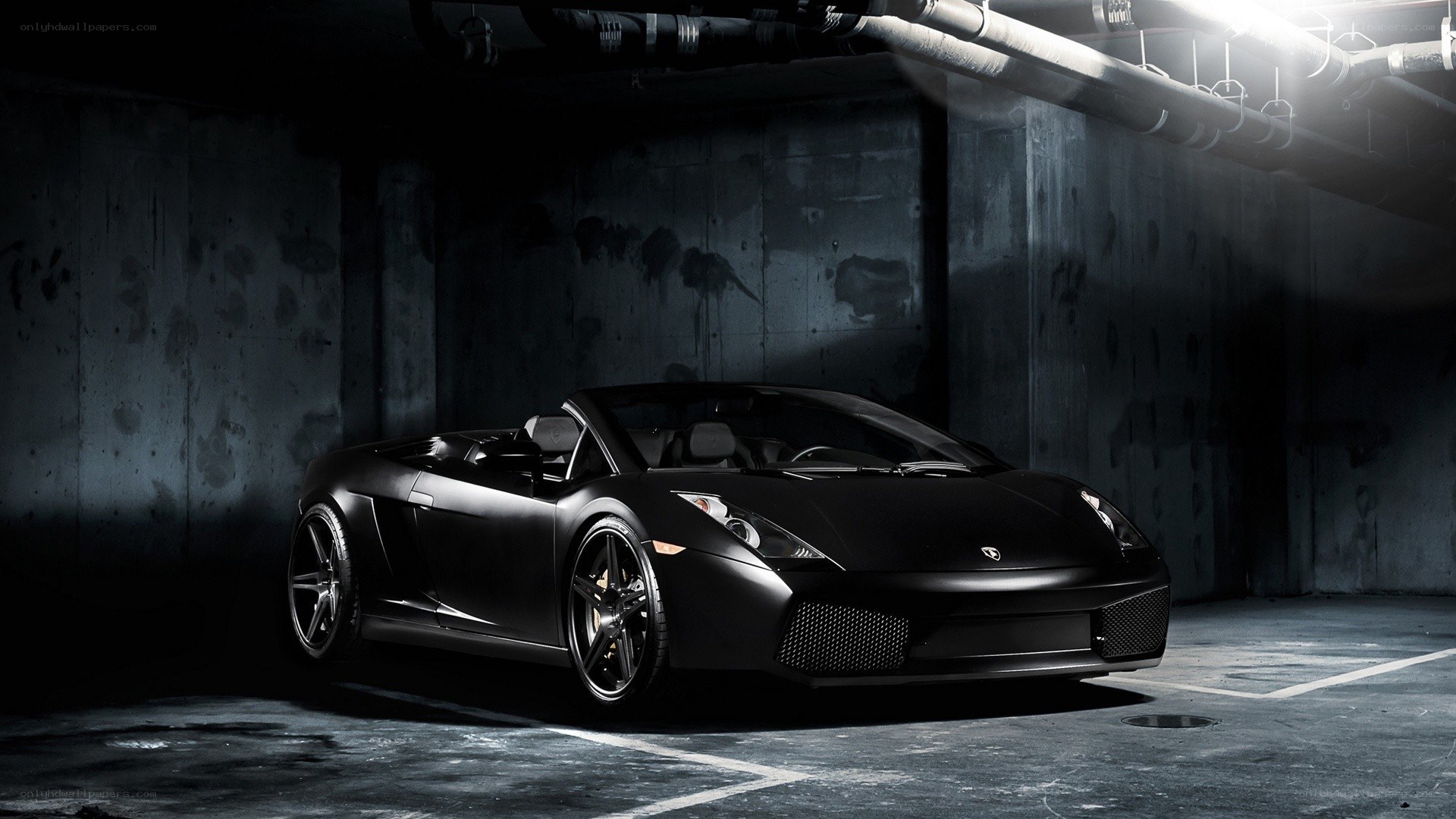 black lamborghini in garage