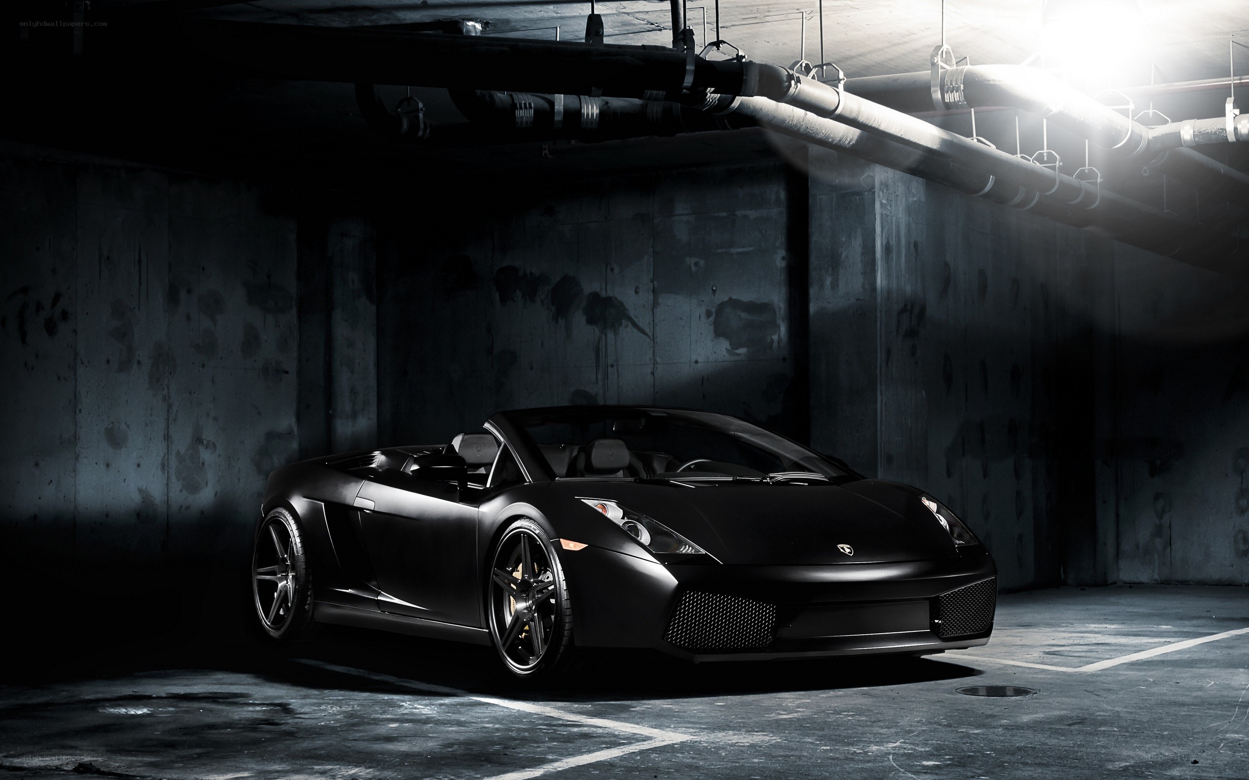 black lamborghini in garage