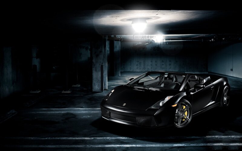 Black Lamborghini in parking garage
