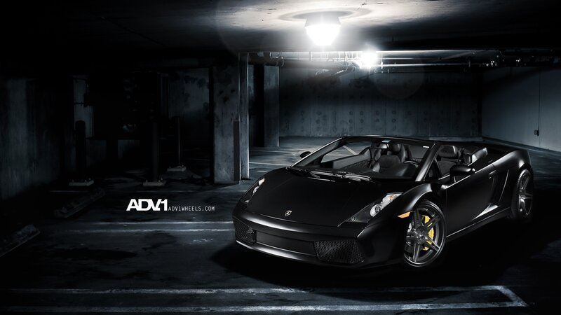 Black Lamborghini in parking garage