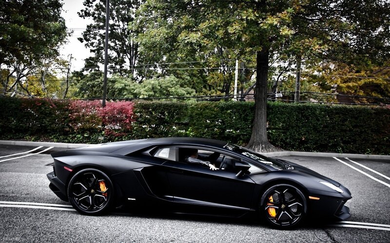 Black Lamborghini in parking lot