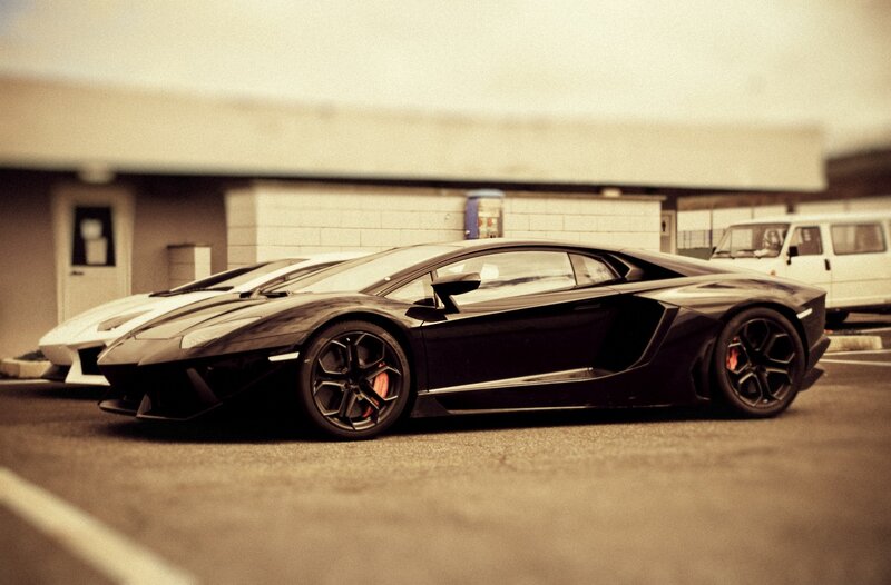 Black Lamborghini in parking lot